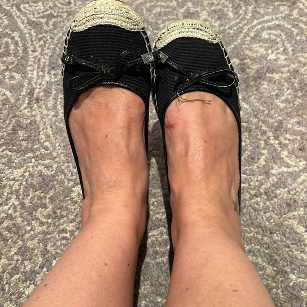 Michael Michael Kors black espadrilles with bow tassels in front in 7